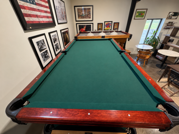 Tidy Pool Room with Game Tables